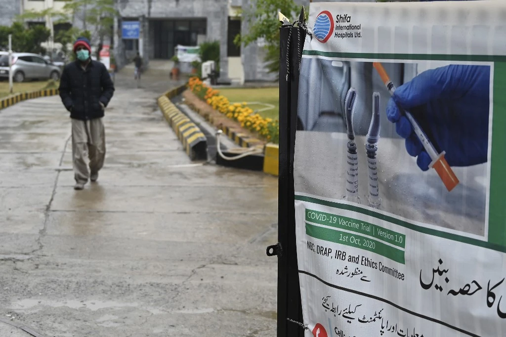 In this picture taken on November 25, 2020 a Pakistani volunteer leaves after being administered a Chinese-made vaccine for the COVID-19 coronavirus at a hospital in Islamabad. (AFP/File)