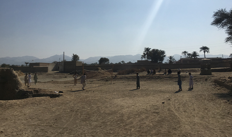 Boys play volleyball on the outskirts of Shah Hassan Khel village, Lakki Marwat district, Khyber Pakhtunkhwa on December 31, 2020. No one has dared to play on the ground in the middle of the village since a suicide attack on January 1, 2010 killed over a hundred of players and spectators. (AN photo)