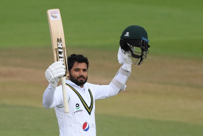 Pakistan's Azhar Ali celebrates after reaching his century on the third day of the third Test cricket match between England and Pakistan at the Ageas Bowl in Southampton, southern England on August 23, 2020. (AFP)