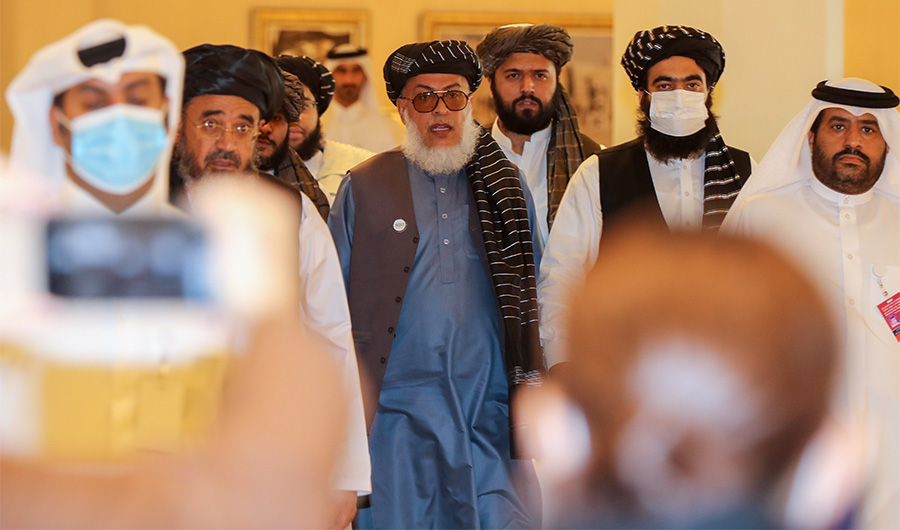 Taliban negotiator Abbas Stanikzai (C) arrives for the opening session of the peace talks between the Afghan government and the Taliban in the Qatari capital Doha on September 12, 2020. (AFP/File)