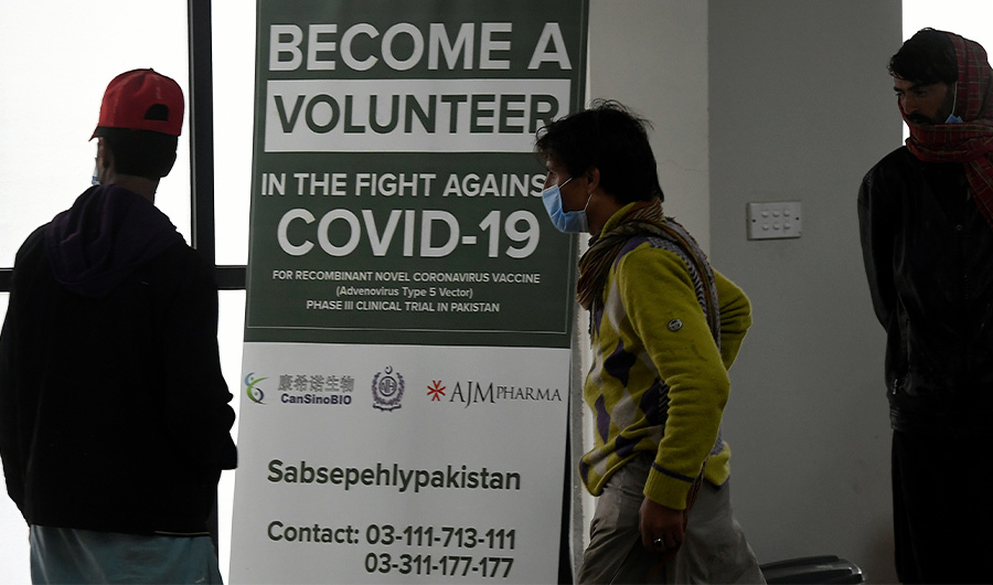 In this picture taken on November 25, 2020 volunteers wait to be administered the new Chinese-made vaccine for the Covid-19 coronavirus, the first ever Phase 3 clinical trial for any vaccine in Pakistan, at a hospital in Islamabad. (AFP)