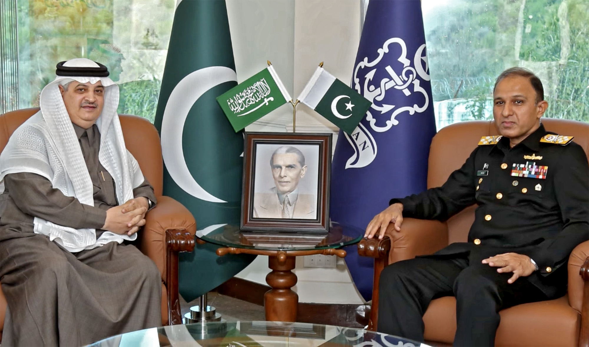 Saudi Ambassador to Pakistan Nawaf bin Said Al-Malki, left, and Pakistani Navy chief Adm. Muhammad Amjad Khan Niazi pose for a photo during their meeting at the naval forces headquarters in Islamabad on Jan. 7, 2021. (Photo courtesy: @dgprPaknavy/Twitter)