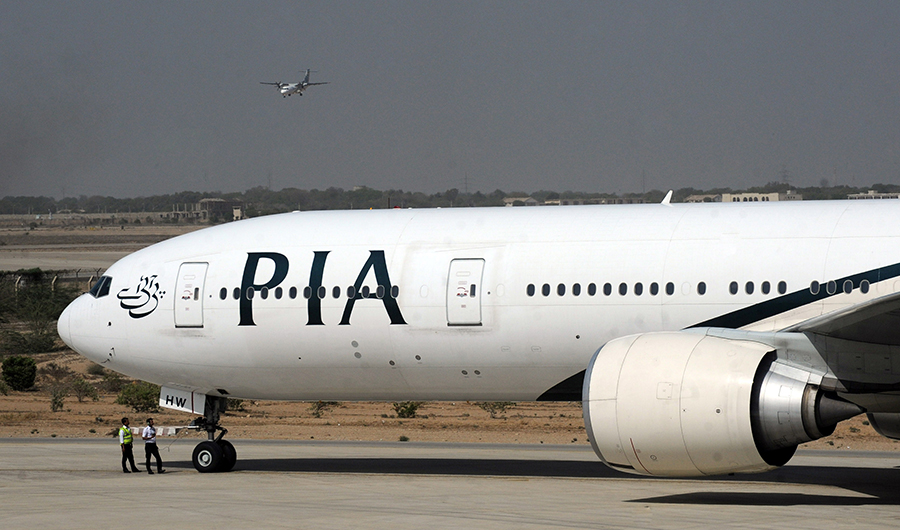 FILE - A Pakistan International Airlines (PIA) plane taxies before take-off from Karachi International Airport in Karachi on April 21, 2010. (AFP/ File)