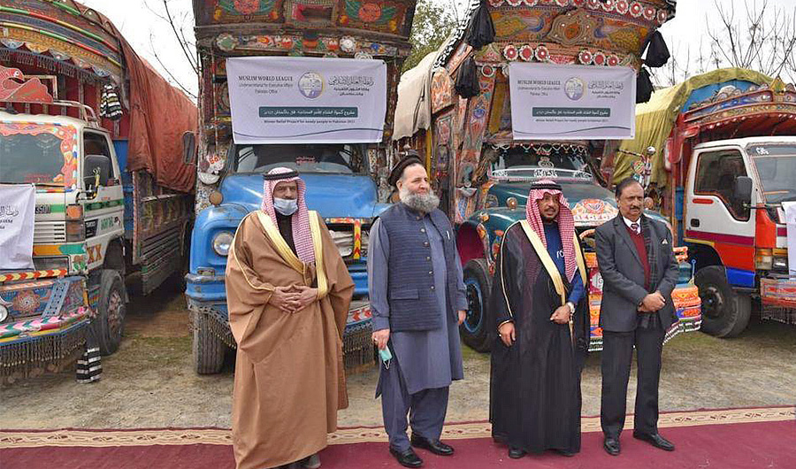 Pakistan’s Religious affairs minister Pir Noor ul Haq Qadri along with Saudi ambassador to Pakistan Nawaf bi Saeed Al-Maliki and officials of the Muslim World League launch a winter relief project in Islamabad, Pakistan, on January 22, 2021. (Photo courtesy: Muslim World League)