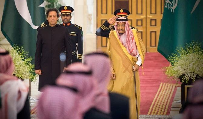 In this handout photograph released by Pakistan’s Press Information Department (PID) on October 23, 2018, Saudi King Salman meets with Prime Minister Imran Khan in Riyadh, Saudi Arabia. (AFP)