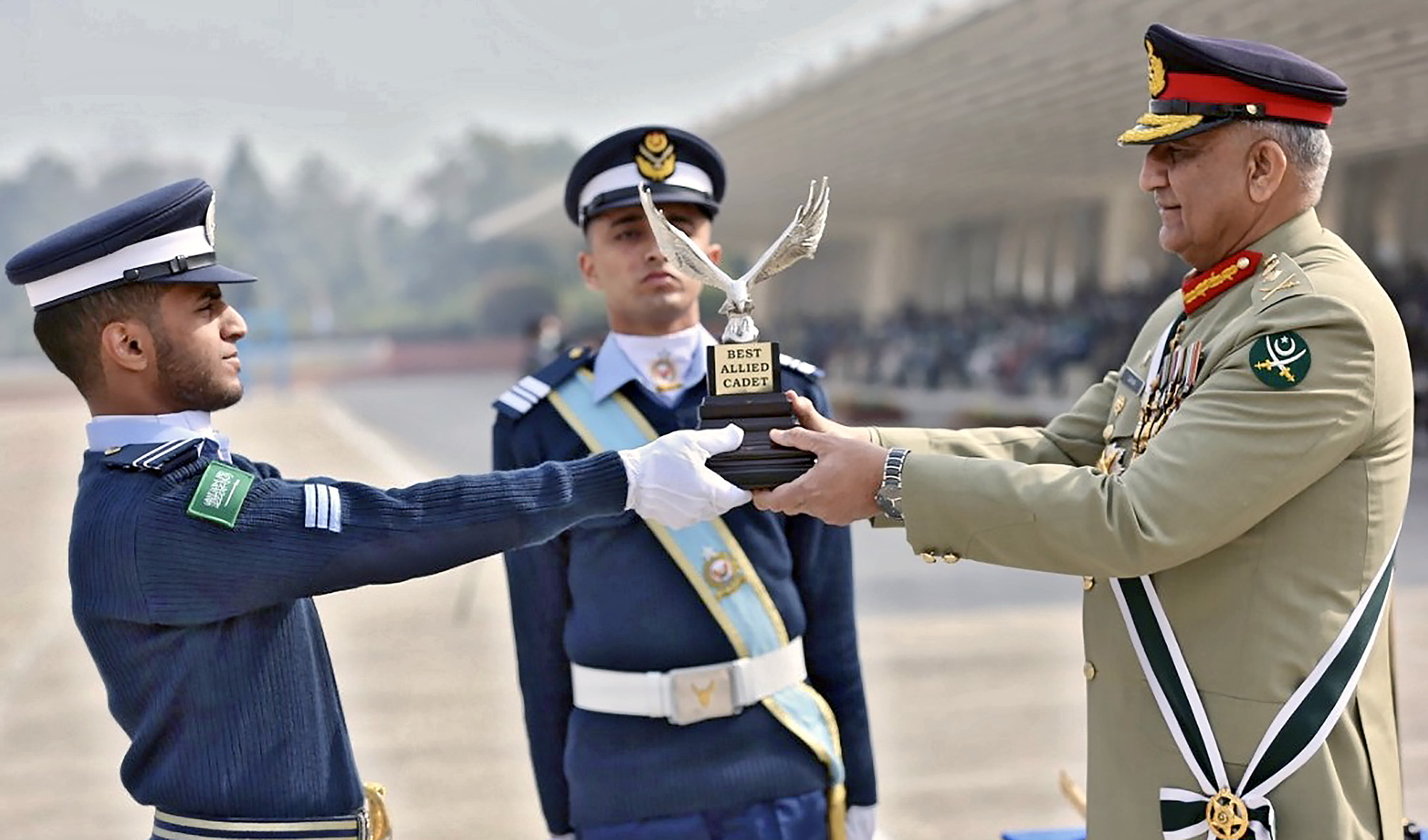 Chief of Army Staff General Qamar Javed Bajwa is awarding the Best Allied Cadet Trophy to a Saudi cadet, Hatim Muhammad Alsofiani, during the graduation ceremony at the Pakistan Air Force Academy in Risalpur on Feb. 2, 2021. (Photo courtesy: Pakistan Air Force)