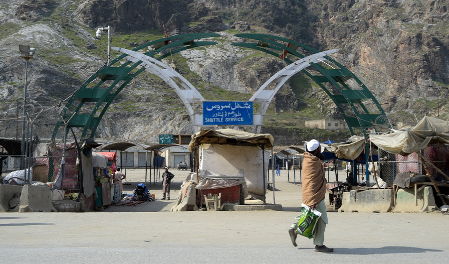 A man walks past an empty bus terminal near the Pakistan-Afghanistan border in Torkham some 54 kms from Peshawar on March 16, 2020. (AFP/File)