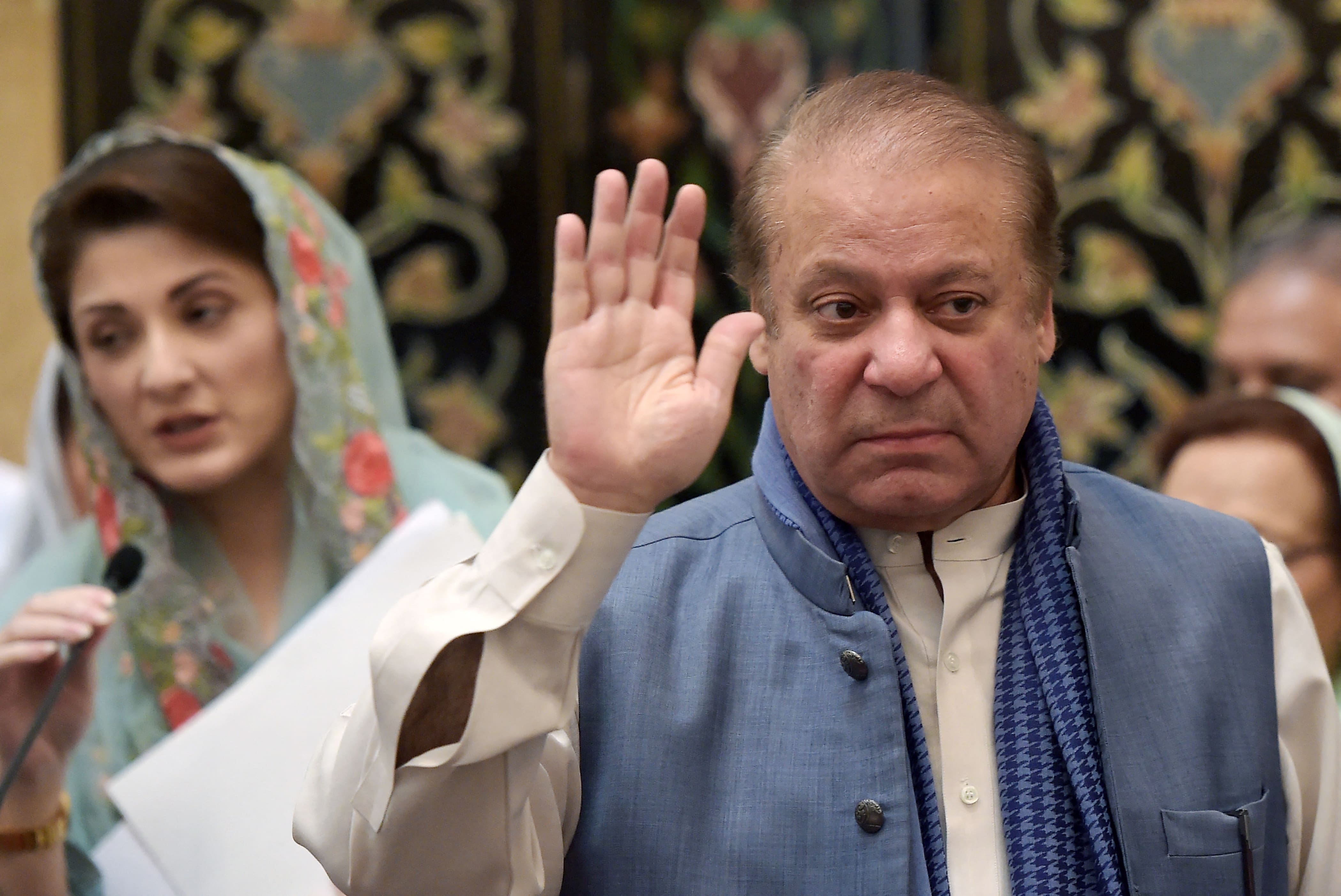 Ousted Pakistani prime minister Nawaz Sharif gestures as he leaves after a press conference of his daughter Maryam Nawaz in Islamabad on May 29, 2018. (AFP)