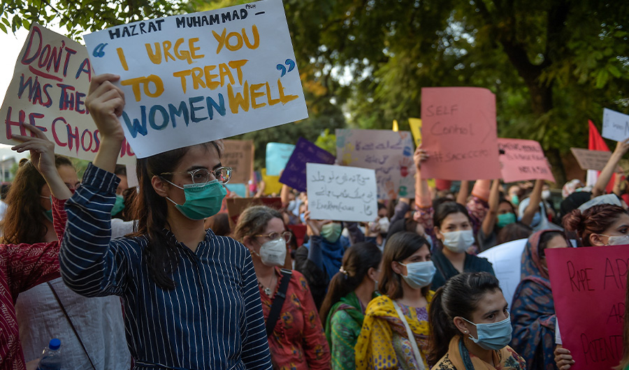 Human right activists march during a protest against an alleged gang rape of a woman, in Islamabad on September 12, 2020. (AFP)