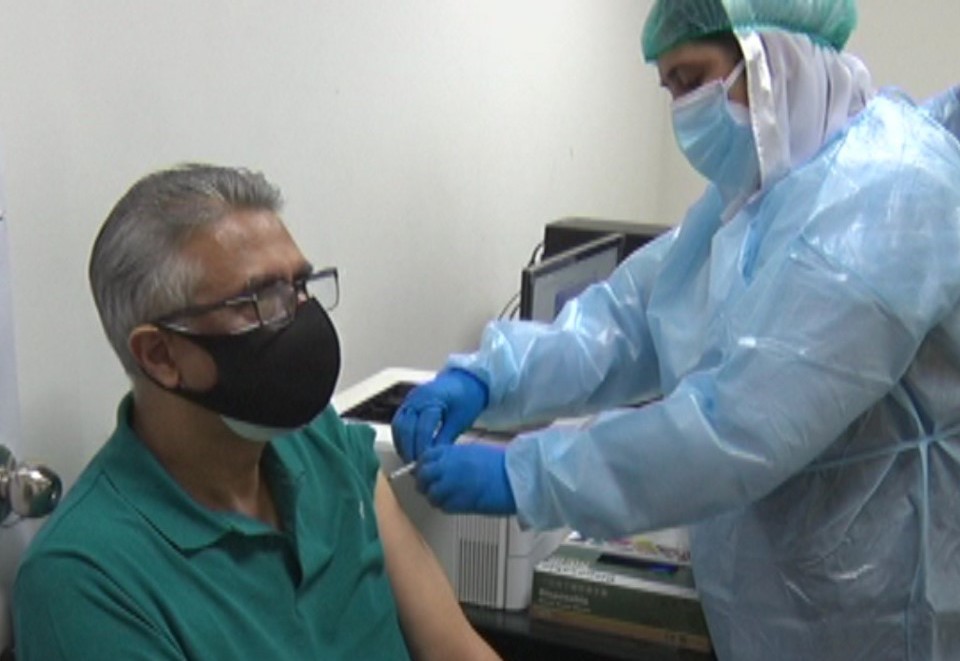 Pakistani health minister Faisal Sultan gets the first dose of China’s Sinopharm vaccine on February 22, 2021 in Islamabad. (Faisal Sultan Twitter Account)