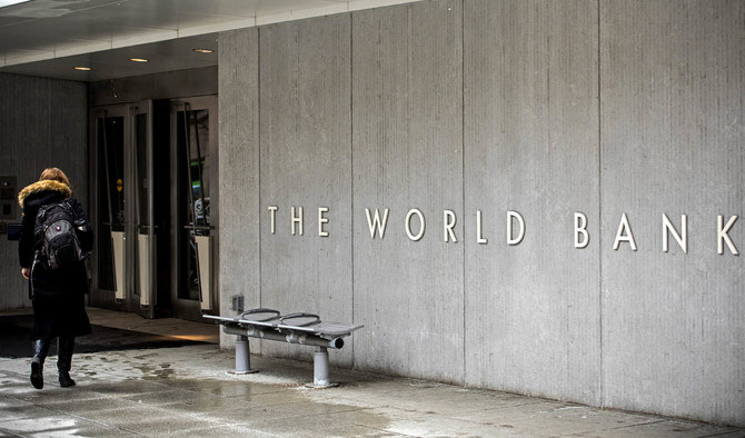 A person enters the building of the Washington-based global development lender, The World Bank Group, in Washington on January 17, 2019. (AFP)