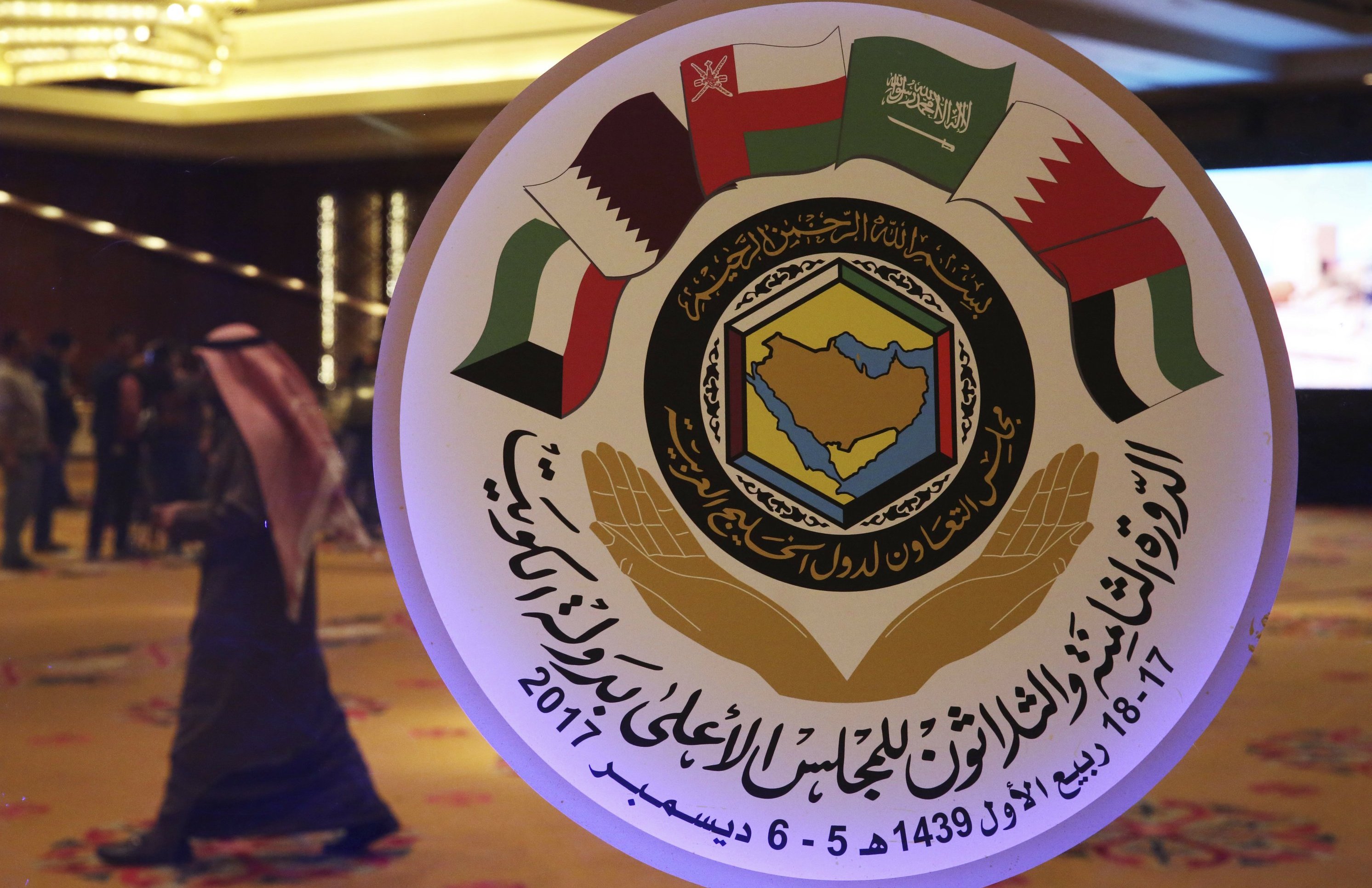 The seal of the Gulf Cooperation Council (GCC) and an announcement of its meeting is on display in Kuwait City, December 4, 2017. (AP/File)