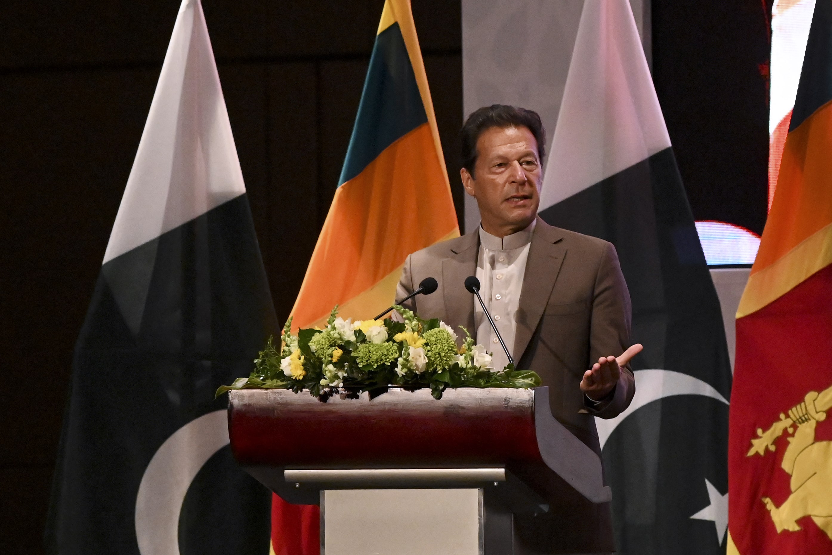Pakistan's Prime Minister Imran Khan speaks at a Trade and Investments conference in Colombo on February 24, 2021 on the second day of Khan's official visit to Sri Lanka. (AFP)