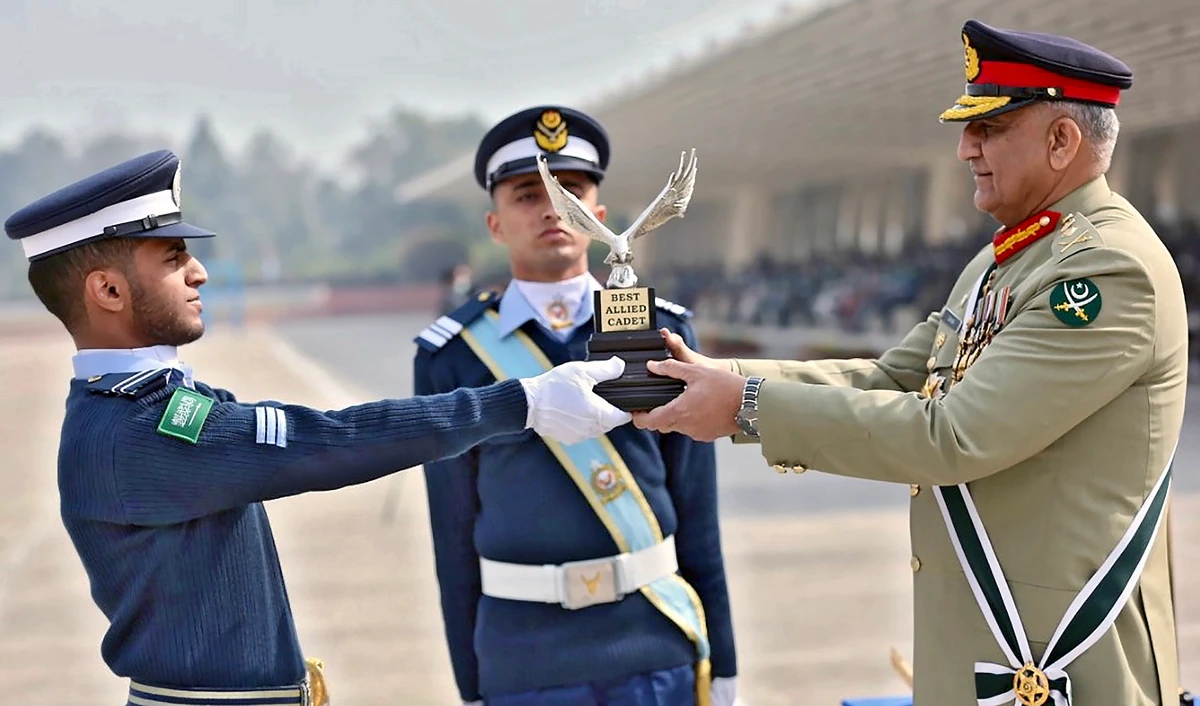 Chief of Army Staff General Qamar Javed Bajwa is awarding the Best Allied Cadet Trophy to a Saudi cadet, Hatim Muhammad Alsofiani, during the graduation ceremony at the Pakistan Air Force Academy in Risalpur on Feb. 2, 2021. (Photo courtesy: Pakistan Air Force)