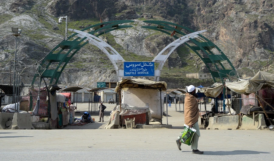 A man walks past an empty bus terminal near the Pakistan-Afghanistan border in Torkham some 54 kms from Peshawar on March 16, 2020. (AFP/File)