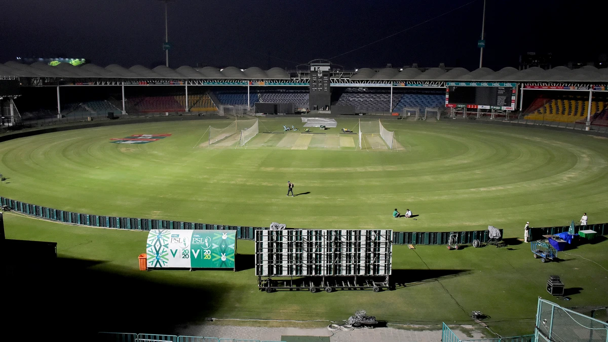 Groundsmen finalize the arrangements for upcoming first match of Pakistan Super League T20 cricket tournament at the National Stadium, in Karachi, Pakistan on February 19, 2021. (AP)