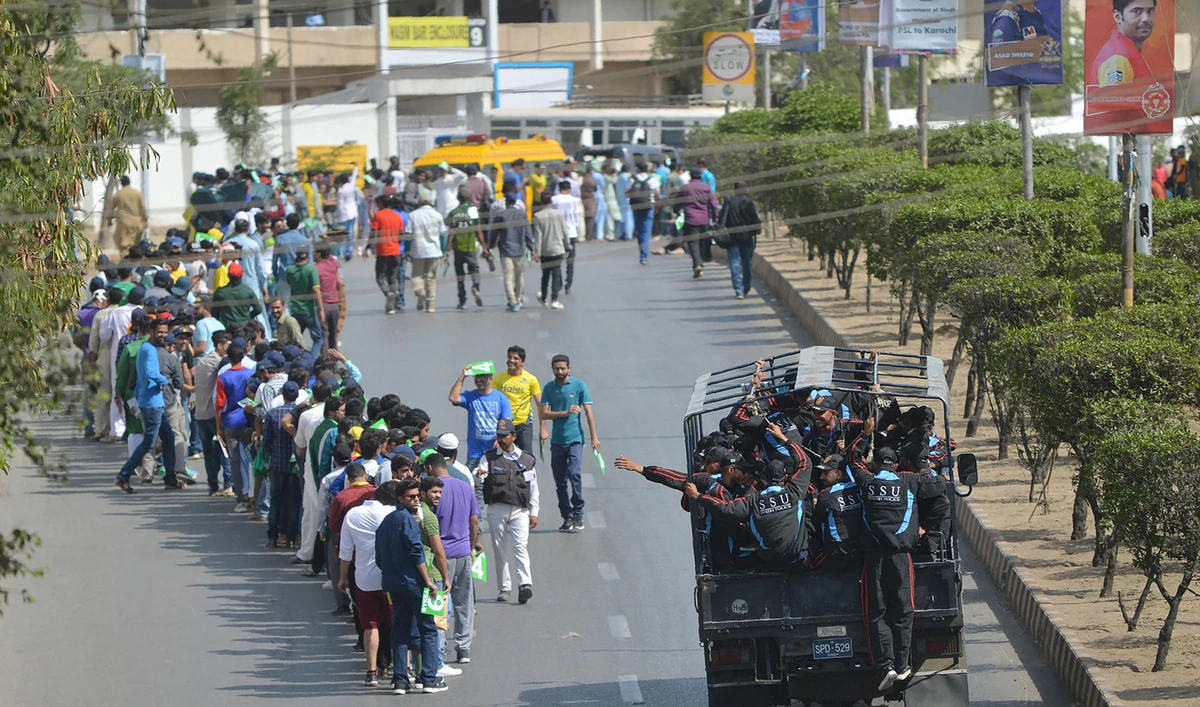 Pakistani cricket fans lineup outside the the National Cricket Stadium in Karachi on March 25, 2018, for the Pakistan Super League final between Peshawar Zalmi and Islamabad United. (AFP/File)