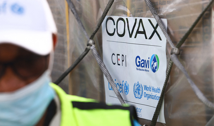 This photograph taken on February 24, 2021 shows a Covax tag on a shipment of Covid-19 vaccines from the Covax global Covid-19 vaccination programme, at the Kotoka International Airport in Accra. (AFP)