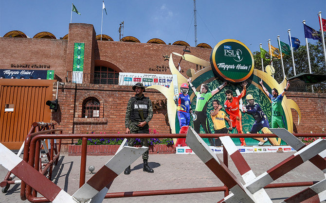 A soldier stands guard outside the Gaddafi Cricket Stadium in Lahore, Pakistan, on March 17, 2020. (AFP/File)