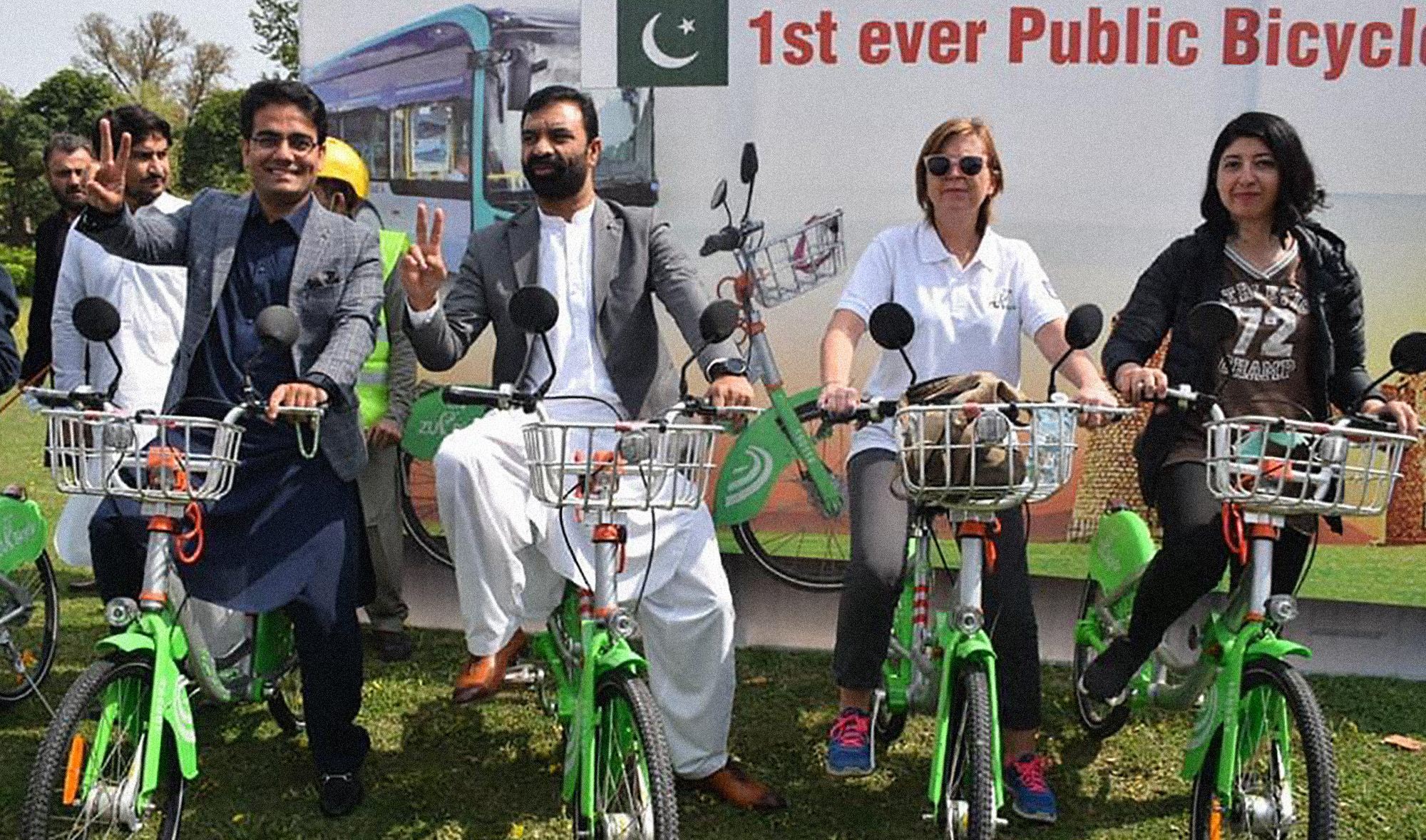 Khyber Pakhtunkhwa (KP) Information Minister Kamran Bangash, left, and KP Information Technology Minister Zia Ullah Bangash pose for a photograph during the launching of the Zu Bicycle bike-sharing system in Peshawar on March 11, 2021. (AN photo)