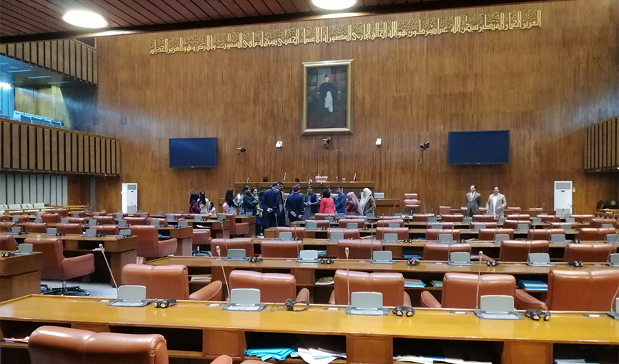 In this undated photo, a group of senators talk to each other after a session of Pakistan's senate in Islamabad. (Photo courtesy: social media)