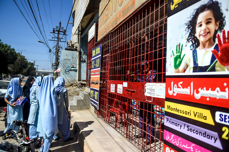 Students leave their school as it is closed by the provincial government that has announced two-day holidays for educational institutions in Karachi on February 27, 2020, after Pakistan detected its first two cases of coronavirus. (AFP/File)