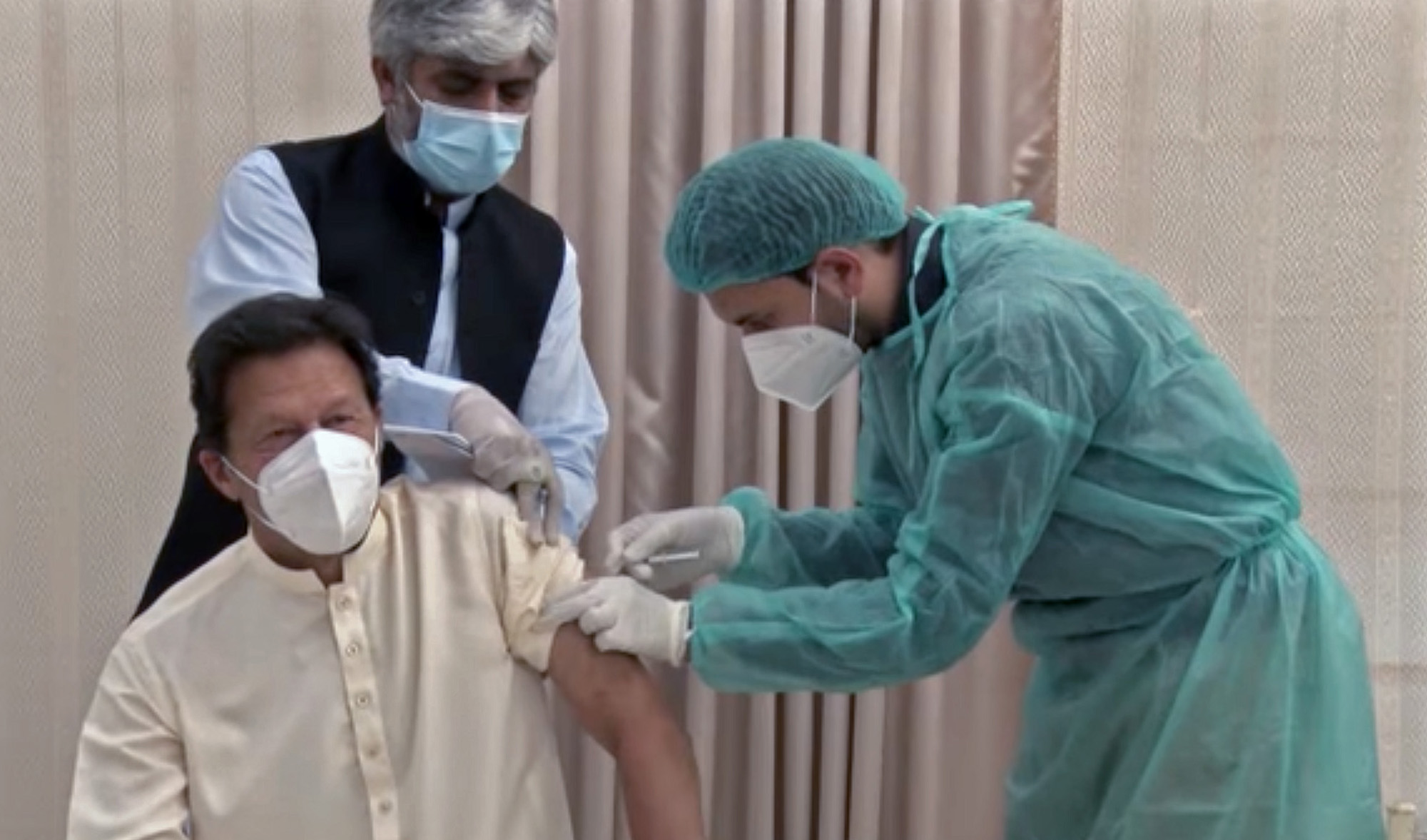 Pakistan Prime Minister Imran Khan gets vaccinated against COVID-19 coronavirus, in Islamabad, Pakistan, on March 18, 2021. (Photo courtesy: Prime Minister's Office)