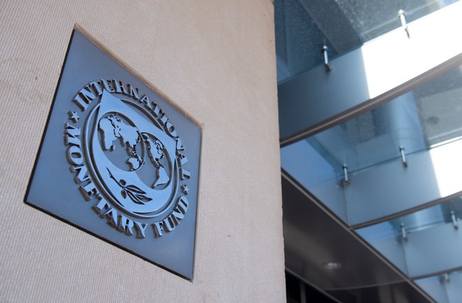 In this file photo taken on April 15, 2020, the seal of the International Monetary Fund (IMF) is seen at its headquarters in Washington, DC. (AFP)