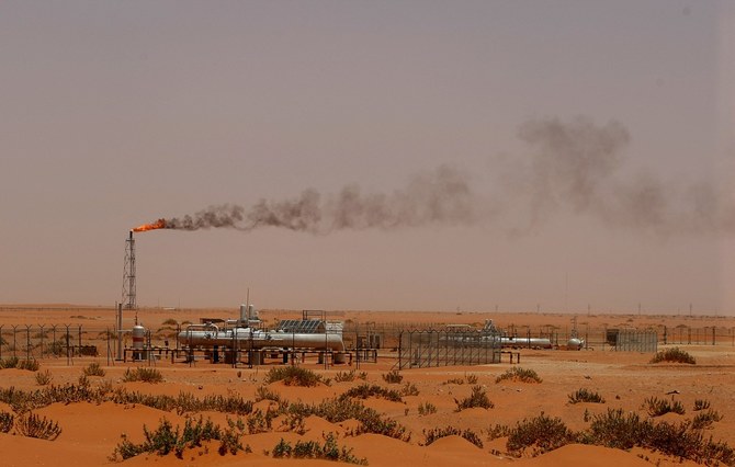 A flame from a Saudi Aramco oil installion known as "Pump 3" is seen in the desert near the oil-rich area of Khouris, 160 kms east of the Saudi capital Riyadh, on June 23, 20. (AFP/File)
