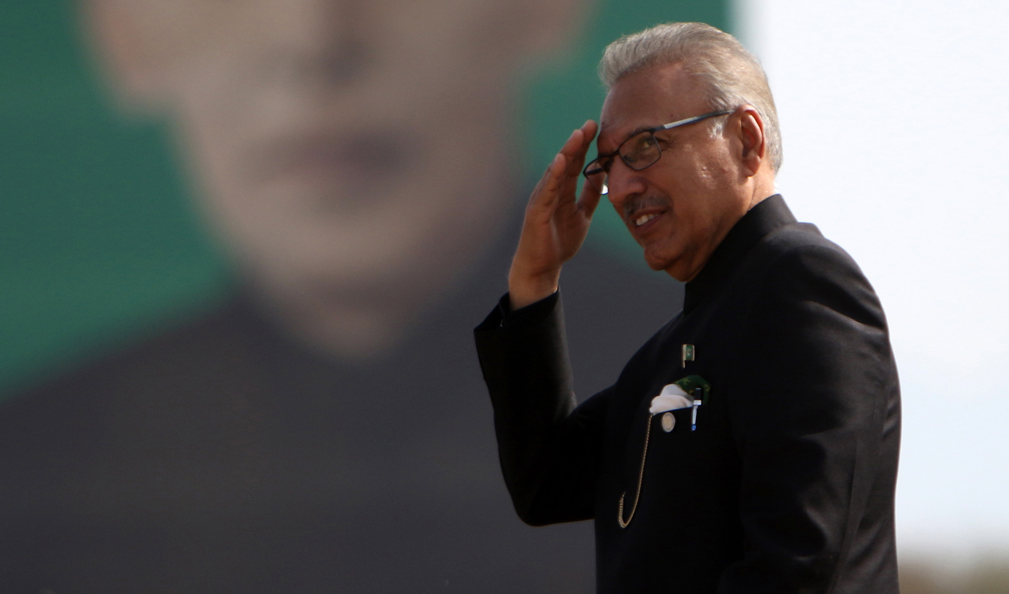 Pakistani President Arif Alvi participates in military parade to mark Pakistan National Day, in Islamabad, Pakistan, on March 25, 2021. (EPA)