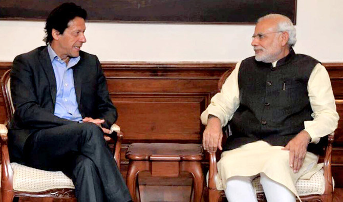 n this file photo, Pakistan's Prime Minister Imran Khan (L) meets Indian Prime Minister Narendra Modi in New Delhi, India on December 11, 2015. (Photo courtesy: India's Ministry of External Affairs)