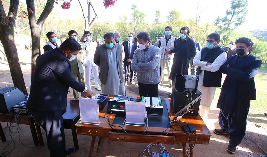 Pakistan's Prime Minister Imran Khan (right in the first row) receives briefing about e-voting in Islamabad, Pakistan, on March 31, 2021. (Photo courtesy: PID)