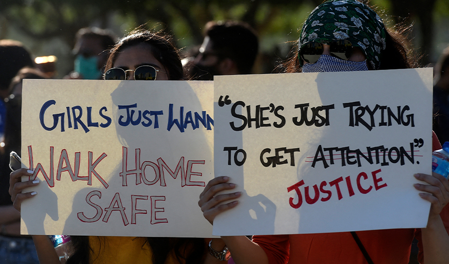 Activists of the Aurat March hold placards as they gather during a rally to mark International Women's Day in Karachi, Pakistan, on March 8, 2021. (AFP/File)