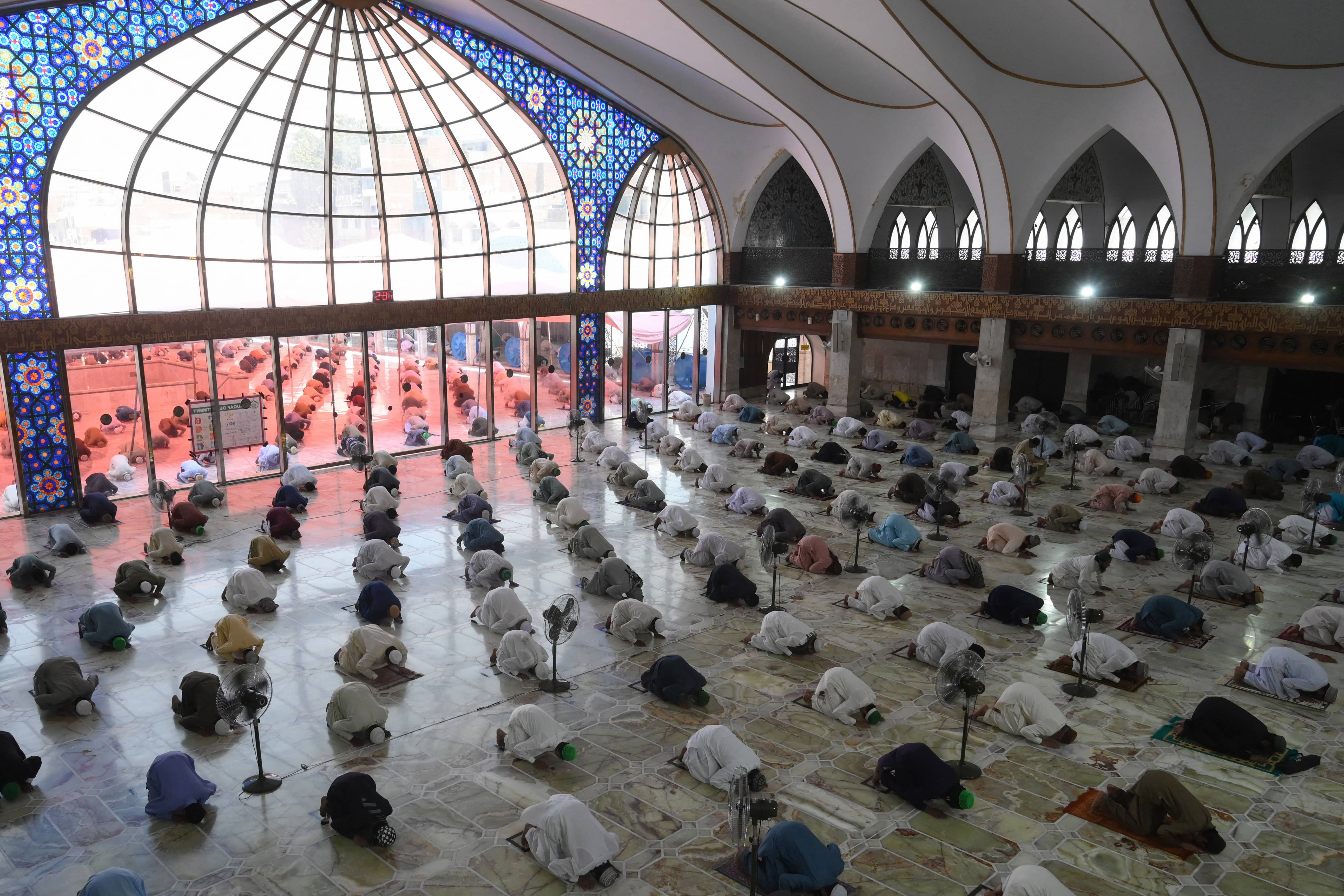 Muslim devotees maintain social distancing as they offer Friday prayers at the Data Darbar Mosque during Islamic holy fasting month of Ramadan in Lahore on May 1, 2020. (AFP/ File)