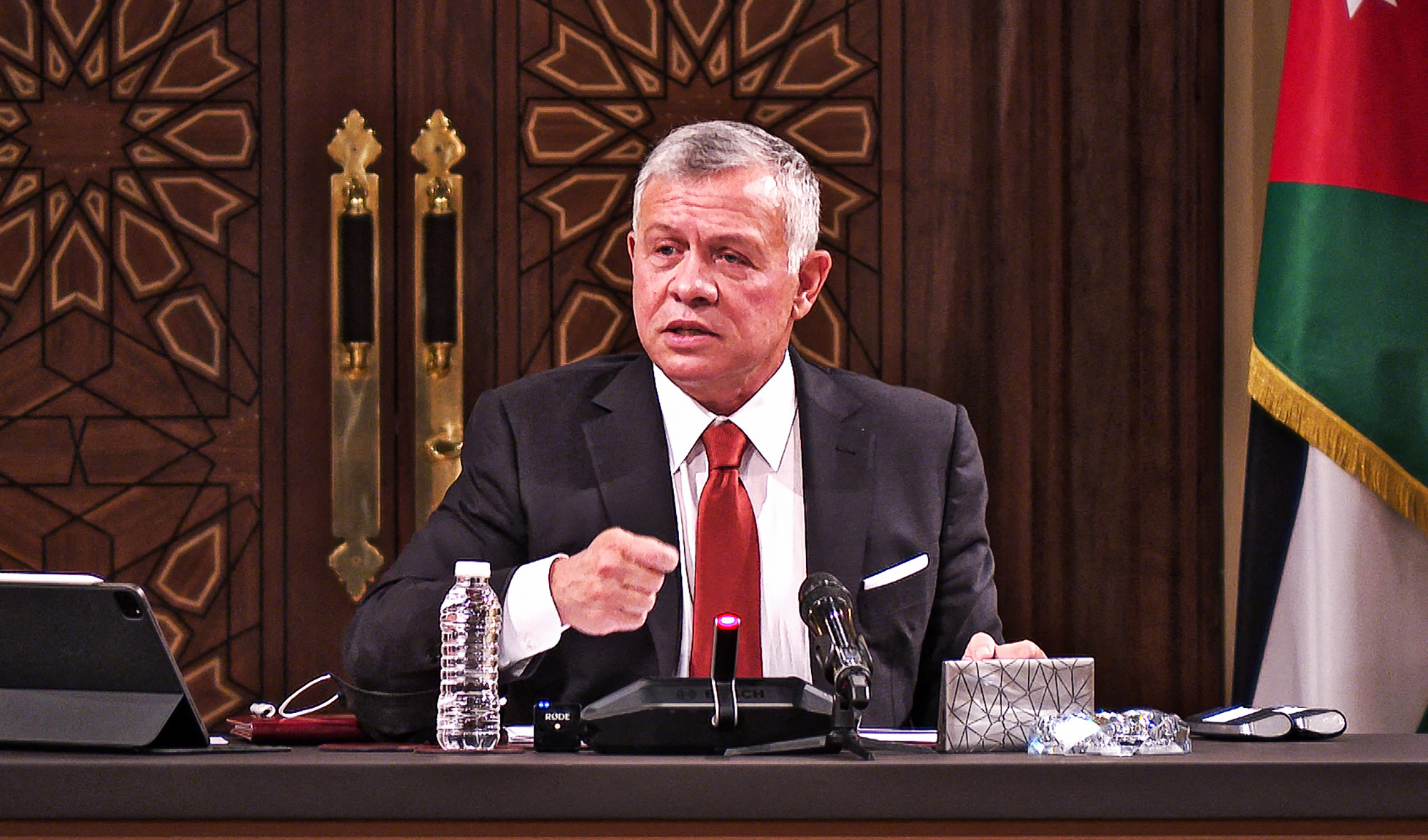 Jordanian King Abdullah II speaking during a meeting with the speaker and heads of a number of committees at the House of Representatives in the capital Amman. Jordanian Royal Palace on March 23, 2021. (AFP/File