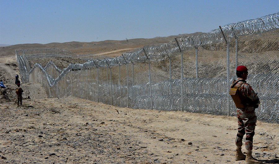 A Pakistani army soldier stands guard along with border fence at the Pak-Afghan border near the Punjpai area of Quetta in Balochistan on May 8, 2018. (AFP/File)