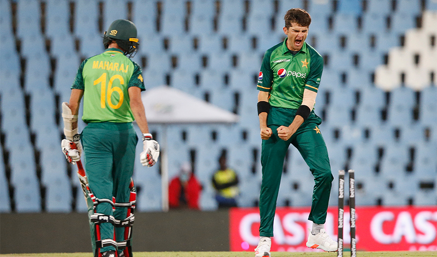 Pakistan's Shaheen Shah Afridi (R) celebrates after the dismissal of South Africa's Keshav Maharaj (L) during the third one-day international cricket match between South Africa and Pakistan at SuperSport Park in Centurion on April 7, 2021. (AFP)