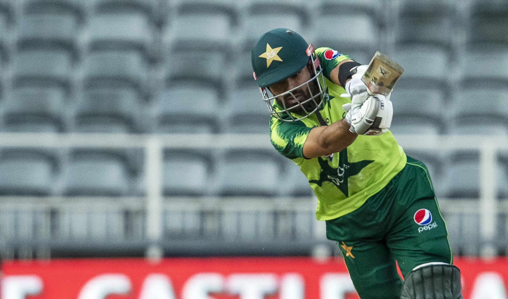Pakistan's batsman Mohammad Rizwan plays a shot during the first T20 cricket match between South Africa and Pakistan at the Wanderers stadium in Johannesburg, South Africa, on April 10, 2021. (AP)