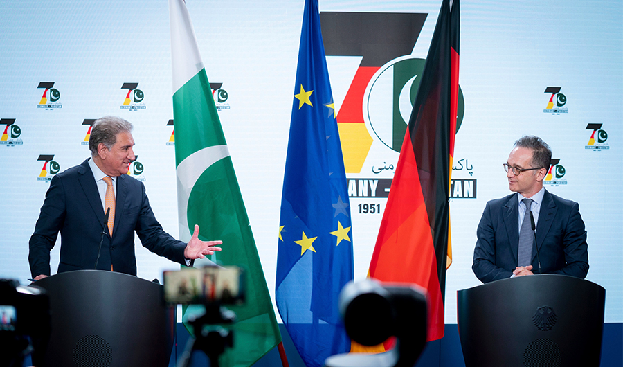 Heiko Maas, German foreign minister, and Makhdoom Shah Mahmood Qureshi, foreign minister of Pakistan, give a press conference together at the Federal Foreign Office in Berlin, Germany, Monday, April 12, 2021. (AP)