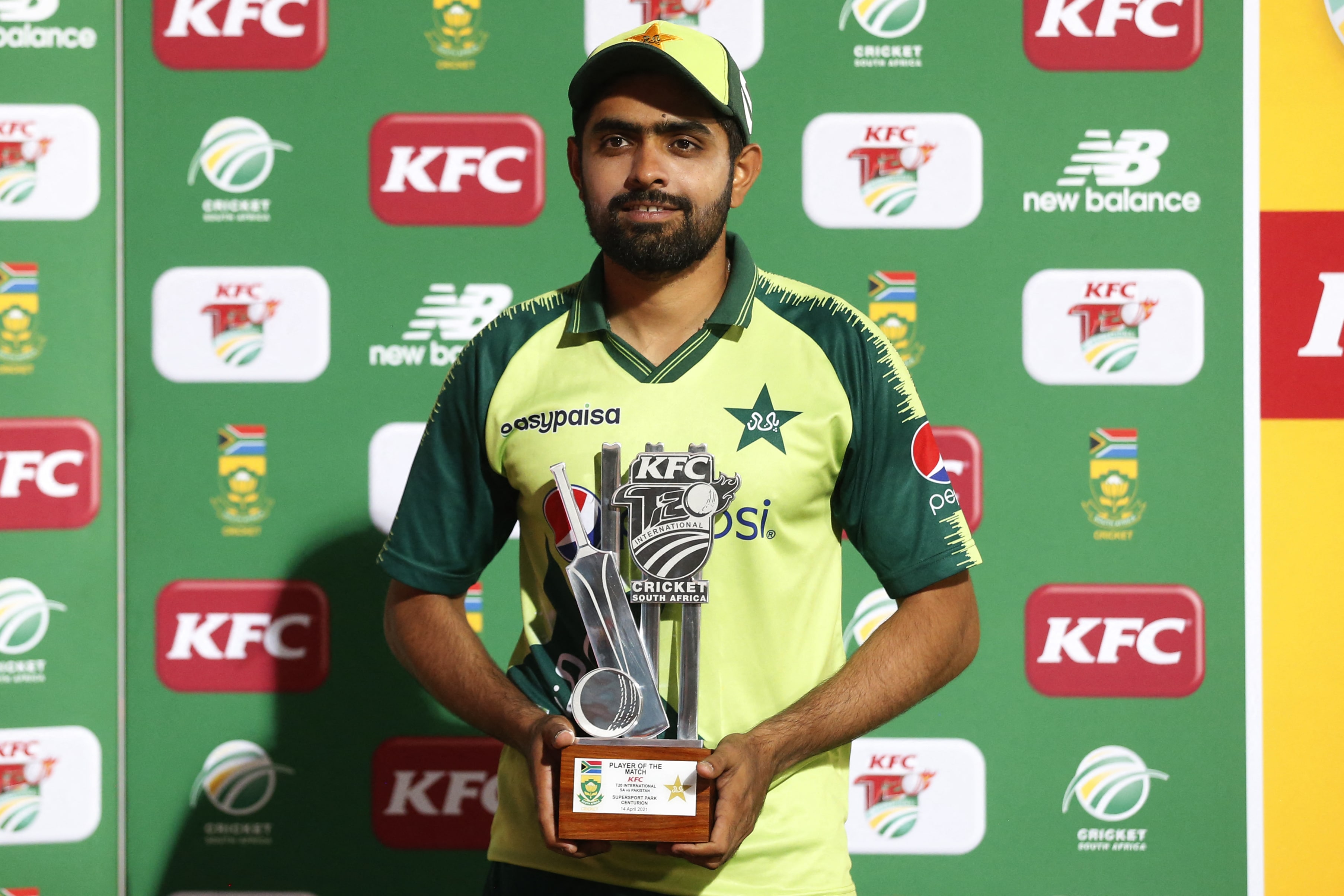 Pakistan's captain Babar Azam poses with the man of the match trophee after the third Twenty20 international cricket match between South Africa and Pakistan at SuperSport Park in Centurion on April 14, 2021. (AFP)