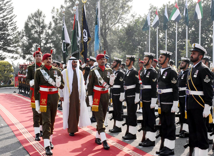 Abu Dhabi's Crown Prince Sheikh Mohamed bin Zayed Al-Nahyan reviews a guard of honor at the Prime Minister House in Islamabad on January 6, 2019, . (AFP via PID/File)