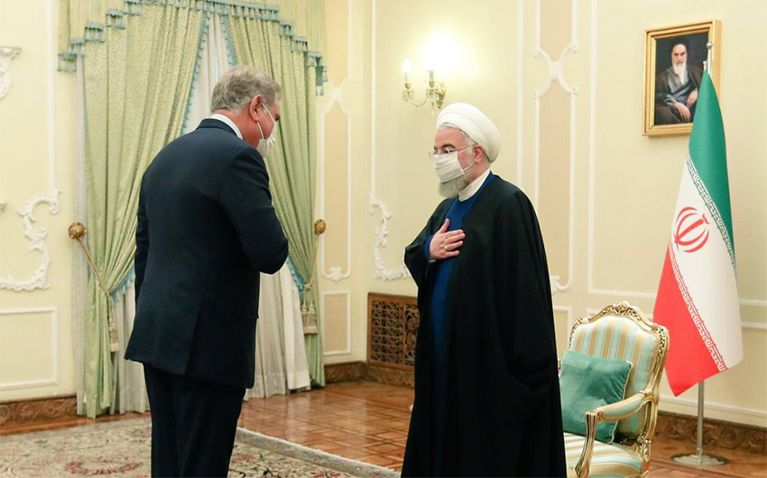 Pakistan’s Foreign Minister, Shah Mahmood Qureshi (left) meets Iranian President Hassan Rouhani in Tehran on April 21, 2021. (Photo courtesy: Shah Mahmood Qureshi/Twitter)