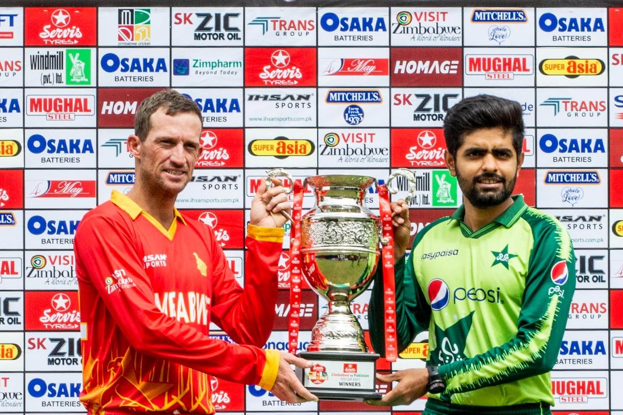 Pakistan's cricket team captain Babar Azam (right) holding T20 trophy with Zimbabwe's cricket team captain Sean Williams on April 20, 2021. (Photo courtesy: Zimbabwe cricket TV)