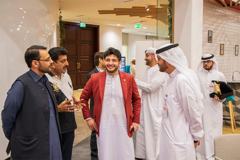 Pakistan Super League's franchise, Peshawar Zalmi's owner Javed Afridi (in red waist coat) attends an event at Sharjah Media City, in UAE, on October 17, 2019. (Photo courtesy: Javed Afridi facebook)