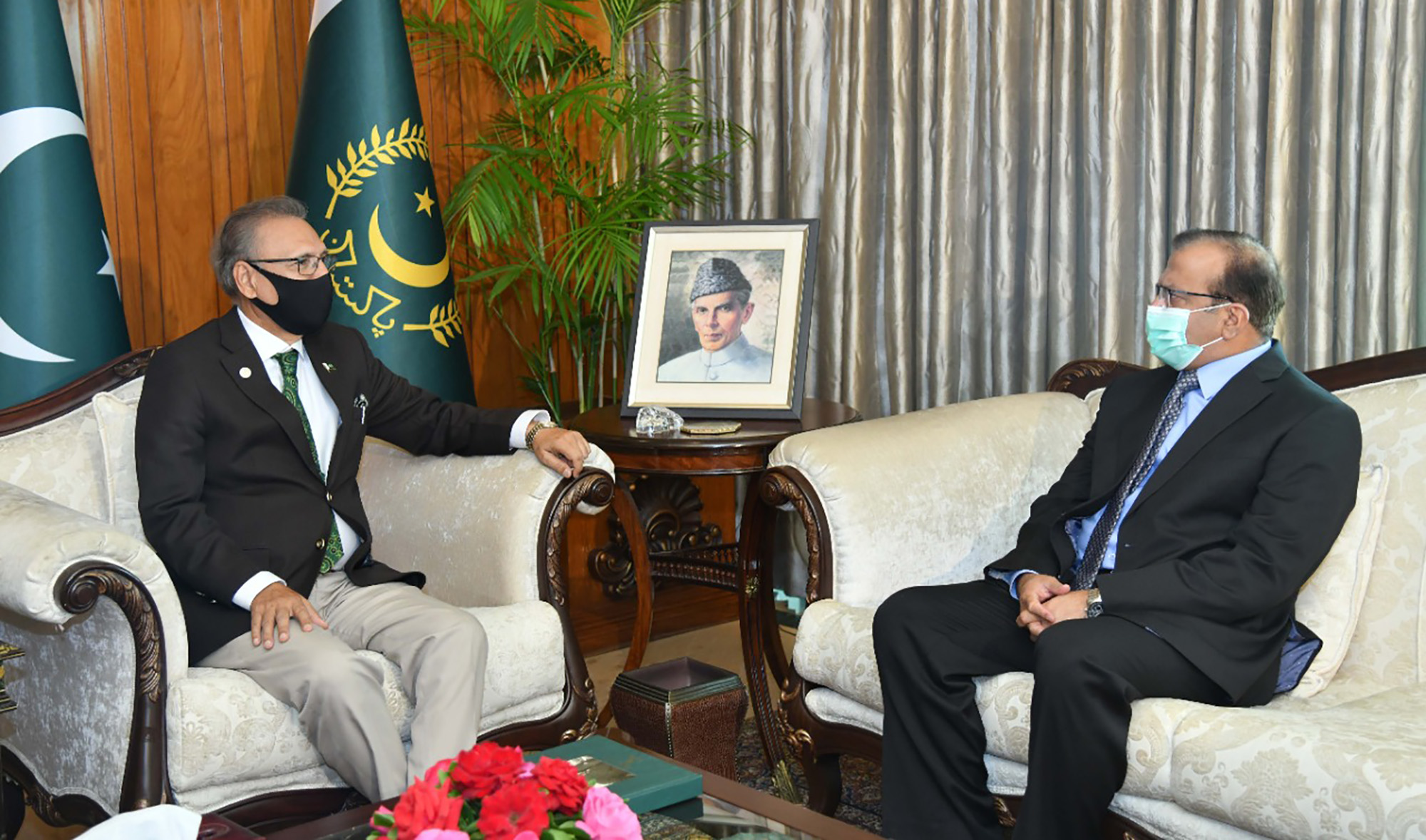 Pakistan’s ambassador-designate to Saudi Arabia, Lt. Gen. (r) Bilal Akbar, right, meets President Arif Alvi in Islamabad on April 22, 2021. (Photo courtesy: @PresOfPakistan/Twitter)