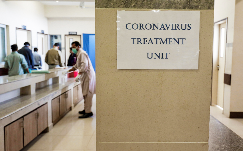 A sign is seen at an isolation wards section, setup for the precautionary measures for the coronavirus patients treatment, at the Jinnah Post Graduate Medical Center in Karachi, Pakistan, on February 3, 2020. (REUTERS)