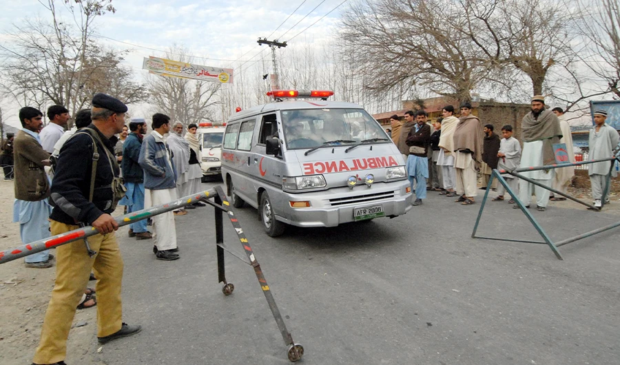 A Pakistani policeman makes way for ambulances in the Swat Valley on March 1, 2008. (AFP/ File)