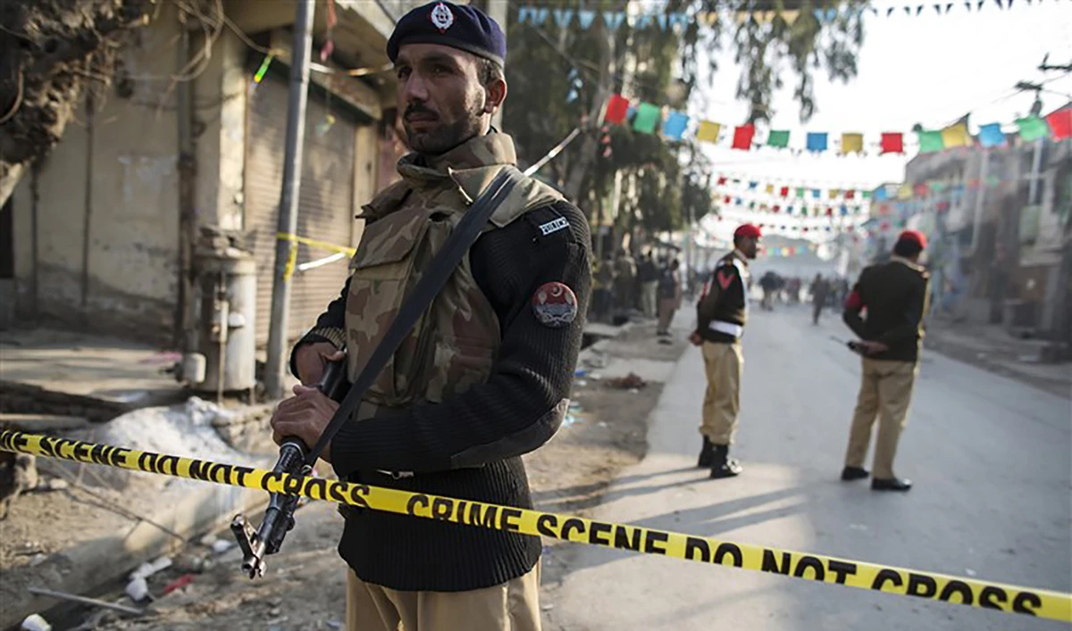A policemen cordons off the site of a suicide blast in Rawalpindi, Pakistan, on January 20, 2014. (REUTERS/File)