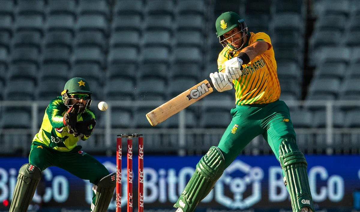 South Africa's batsman Aiden Markram, right, plays a shot as Pakistan's wicketkeeper Mohammad Rizwan watches on during the second T20 cricket match between South Africa in Johannesburg on April 12, 2021. (AP)