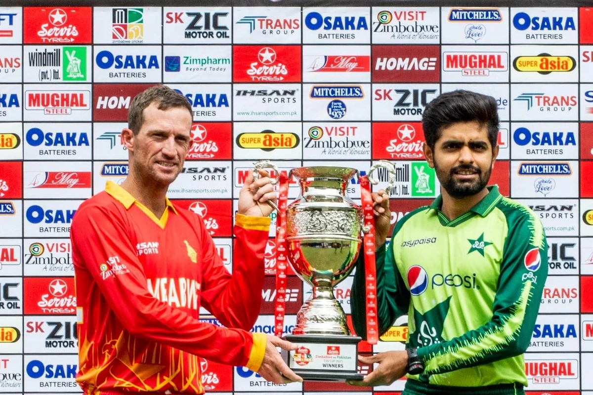 Pakistan's cricket team captain Babar Azam (right) holding T20 trophy with Zimbabwe's cricket team captain Sean Williams on April 20, 2021. (Photo courtesy: Zimbabwe cricket TV)